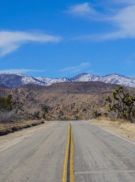 Pioneertown Road and snowy mountains photo